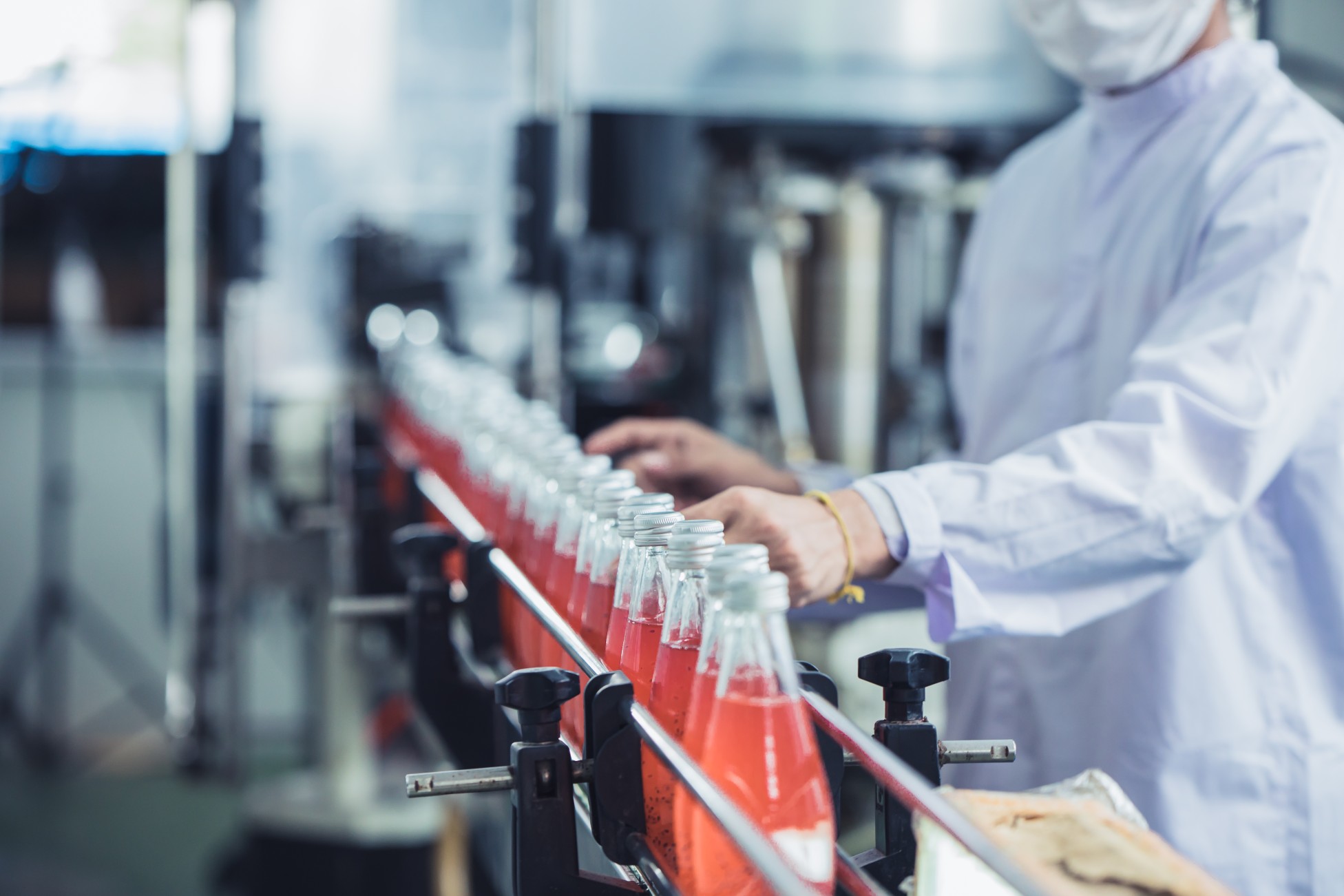 drink-factory-closeup-hygiene-worker-working-check-juice-glass-bottled-production-line
